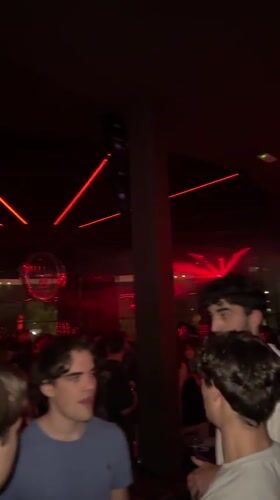 Turin nightclub scene captured with dynamic lighting effects