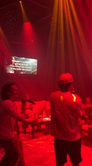 Two men perform karaoke in Baan Bang Rak venue