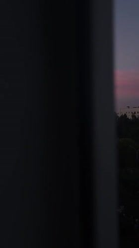 Minsk skyline at dusk, blues and pinks fading to night