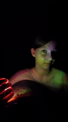 Domestic evening scenes: guitar playing, tulips, colored lighting captured