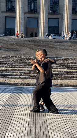 Tango couple performs romantic dance at Buenos Aires university