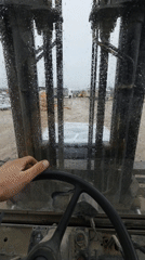 Industrial work activities documented at Bulgarian facility during rain