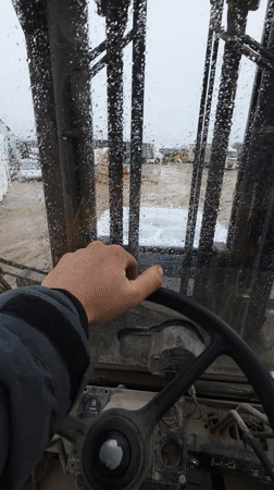 Industrial work activities documented at Bulgarian facility during rain