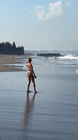 Morning beach activities captured at North Kuta, Indonesia