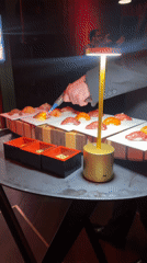 Chef torches sushi at Geneva restaurant dining service