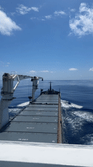 Cargo ship transits Atlantic waters in clear conditions