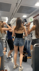 Passengers perform impromptu song and dance aboard moving train