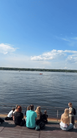 Speedboat racing event along Kama River embankment in Perm