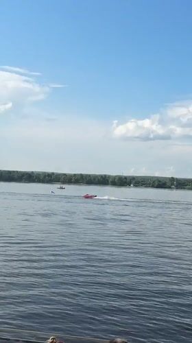 Speedboat racing event along Kama River embankment in Perm