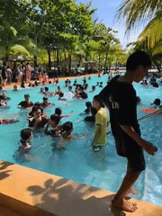 Water park busy with families during morning hours in Vietnam