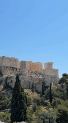 Tourist documents morning visit to Athens Acropolis with photos