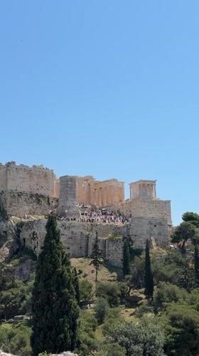 Tourist documents morning visit to Athens Acropolis with photos