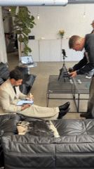 Professional meeting or filming session captured in London interior