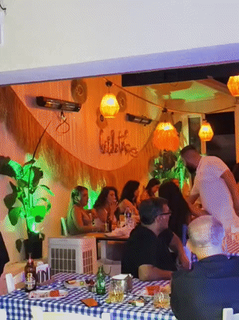 Casual evening at a checkered-tablecloth spot in Kuşadası