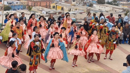 Folk dancers and brass bands celebrate in Arica's plaza