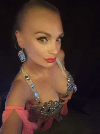 Belly dancing costume and pose in Kuşadası