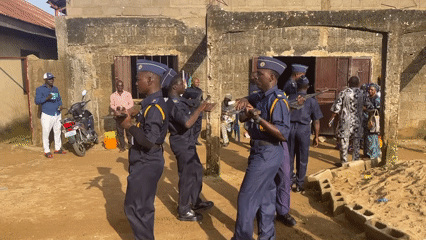Uniformed drill formation with rifles in Gudi, Nigeria