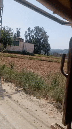 Vehicle documents rural road conditions in Mansehra, Pakistan