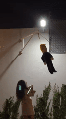 Trump piñata broken at nighttime gathering in Mexico