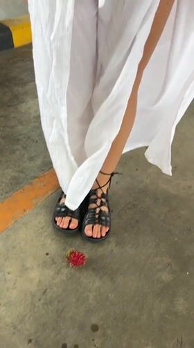 Woman shops at Thai Makro store early morning