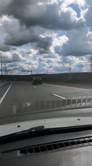Morning highway traffic observed in Pazderino, Russia