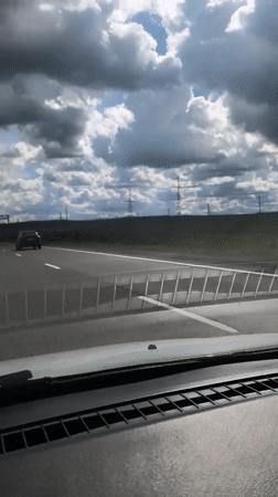 Morning highway traffic observed in Pazderino, Russia