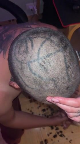 Tattooed individuals share haircut moment in Herceg Novi