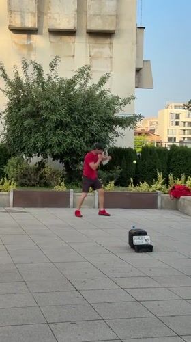 Man practices ball skills around Plovdiv landmarks