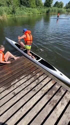 Kayaking and canoeing on a calm lake near Brest