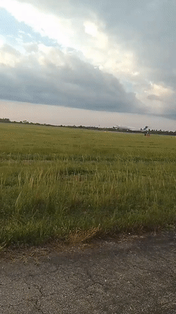 Aircraft departs Orerokpe runway during sunset