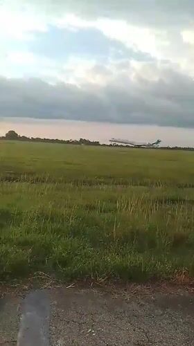 Aircraft departs Orerokpe runway during sunset