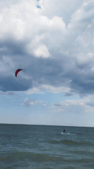 Kitesurfers on a cloudy afternoon in Constanța, Romania
