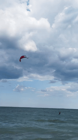 Kitesurfers on a cloudy afternoon in Constanța, Romania