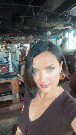 Woman records selfie video in North Kuta, Indonesia