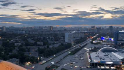 Yekaterinburg at dusk, seen from the ground and the air