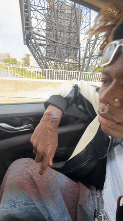 Passenger rests during drive past Ikoyi construction site