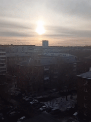 Early morning scenes captured in snowy Novosibirsk residential area