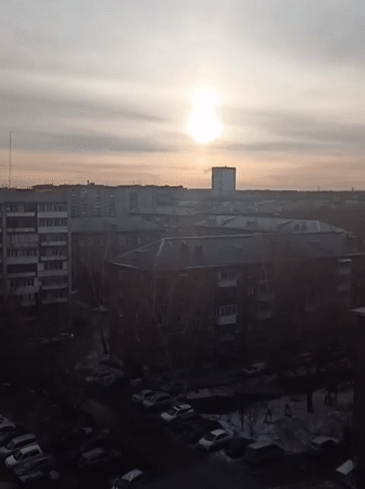 Early morning scenes captured in snowy Novosibirsk residential area