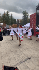 Traditional folk dancing and singing at an outdoor event in Ivanteyevka
