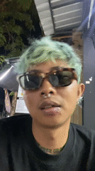 Green-haired person spotted in Kuta, Indonesia