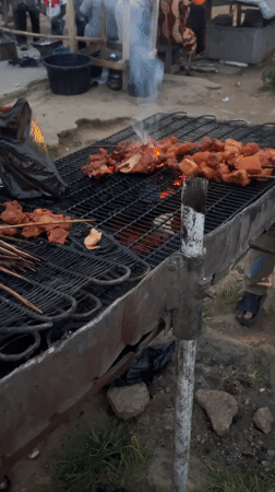 Open-air suya grilling on Rukuba Road, Nigeria