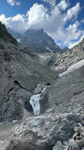 Waterfall and glacier views in Georgia's high alpine terrain