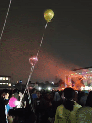 Nighttime concert in South Tangerang with fireworks and balloons