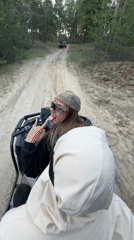 ATV riders enjoy forest trails near Bol'shoye Kozino, Russia