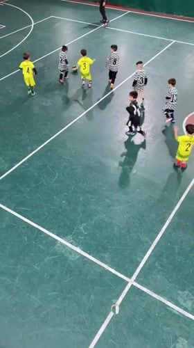 Youth soccer teams play indoor match in Wilde, Argentina