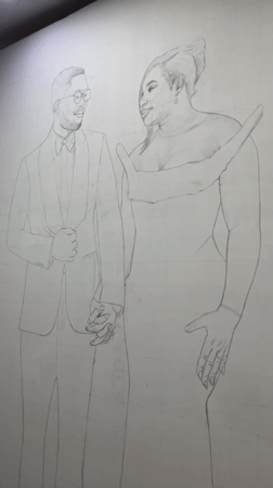 Traditional Nigerian couple portraits sketched on walls in Ado