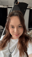 Woman documents photo session with cameras and crown