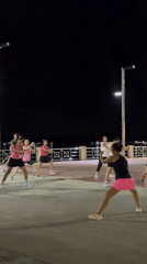 Night aerobics class on Surat Thani's riverside promenade
