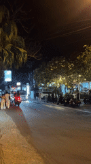 Street life and DJ performance documented in Kuta Selatan
