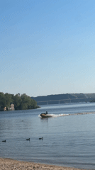 Jet skier enjoys calm waters at Russian beach